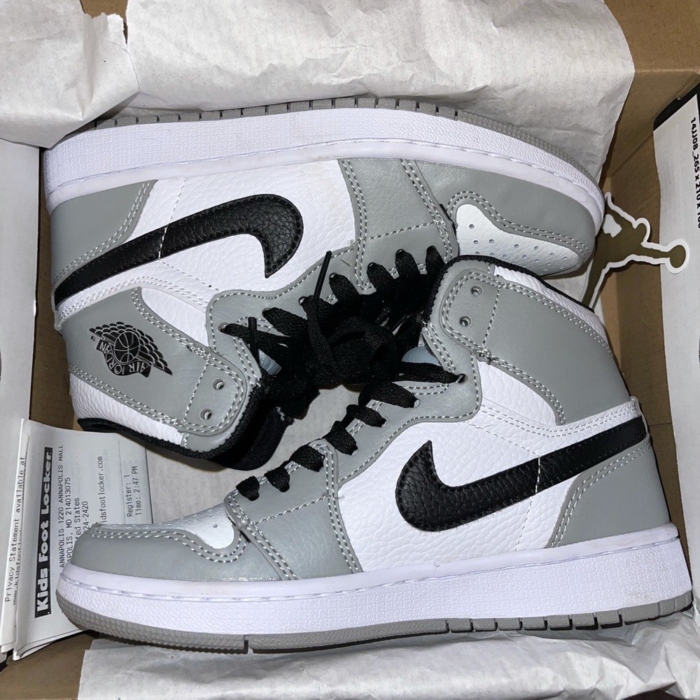 Grey/white/black Jordan Mid